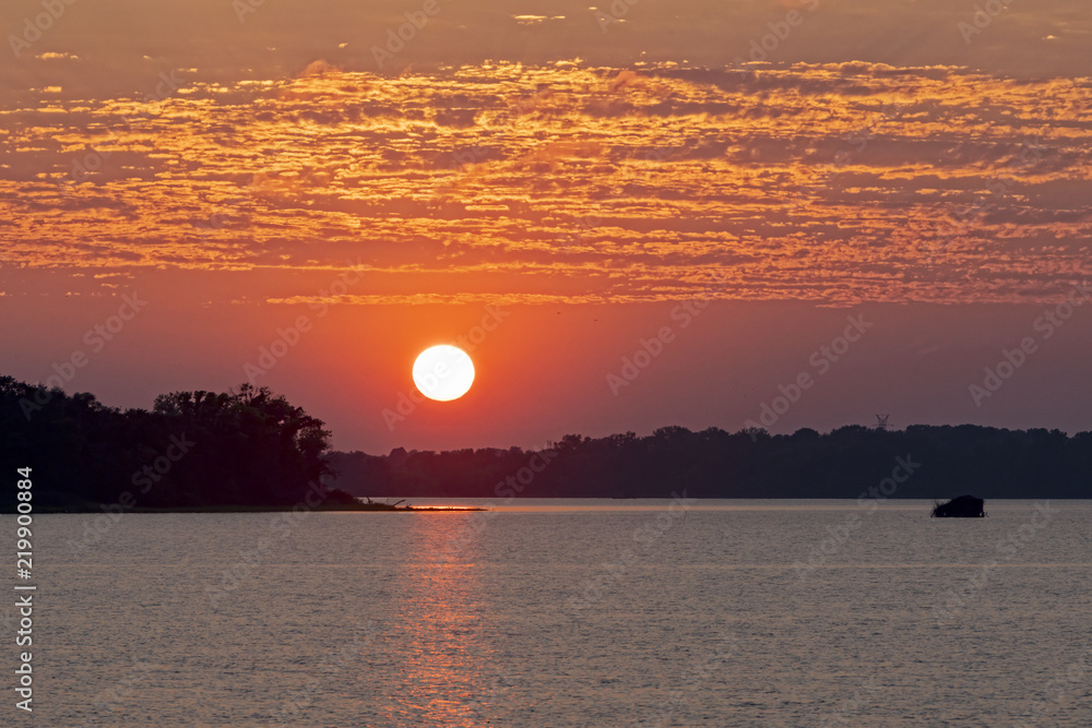 An Orange sky sunset over Horseshoe Lake Staye Park in Granite City IL. An Orange sky sunset over Horseshoe Lake Staye Park in Granite City IL.