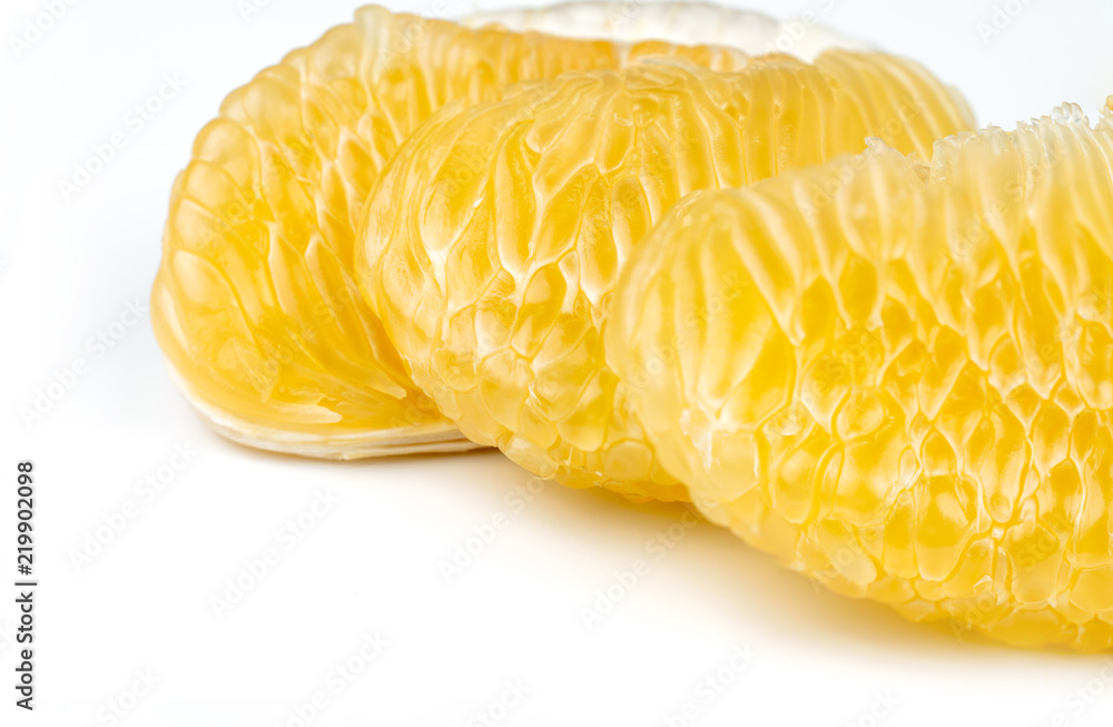 Pomelo pulp without seeds isolated on white background. Thailand pomelo fruit. Natural source of