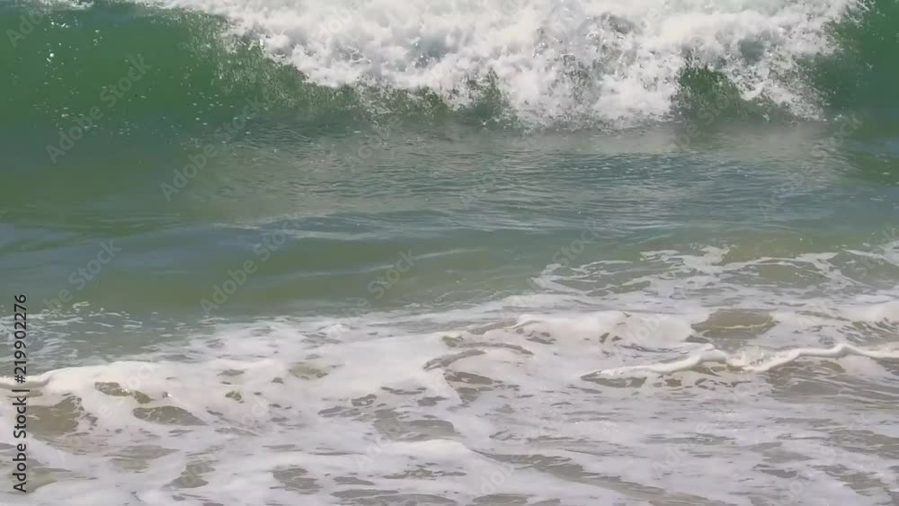 Slow motion waves crashing on a sunny summer day in Santa Monica, CA Slow motion waves crashing on a sunny summer day in Santa Monica, CA