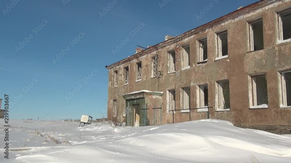 Abandoned house in city Coal Mines on Chukotka of far north of Russia. Way to ghost town Gudym. Former military town. Unique place for stalkers. Abandoned house in city Coal Mines on Chukotka of far north of Russia. Way to ghost town Gudym. Former military town. Unique place for stalkers.