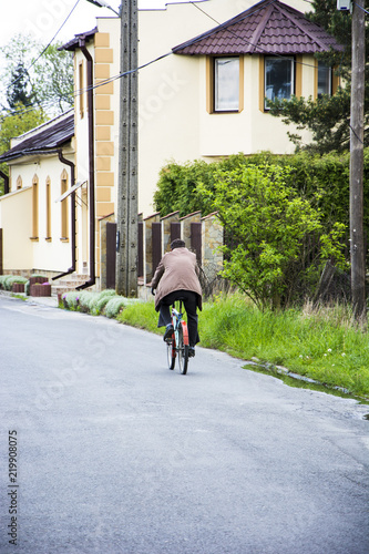 Wallpaper Mural Elderly man on a bicycle Torontodigital.ca