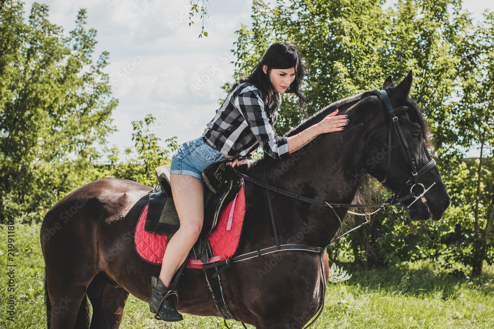 Nice scene woman with a horse in the countryside. Concept of horse and human. Portrait of vintage style artistic woman walking with horse outdoors Nice scene woman with a horse in the countryside. Concept of horse and human. Portrait of vintage style artistic woman walking with horse outdoors