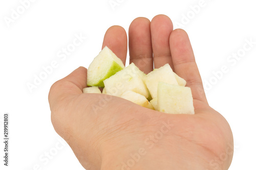 guava fruit cube hold hand isolated on white background