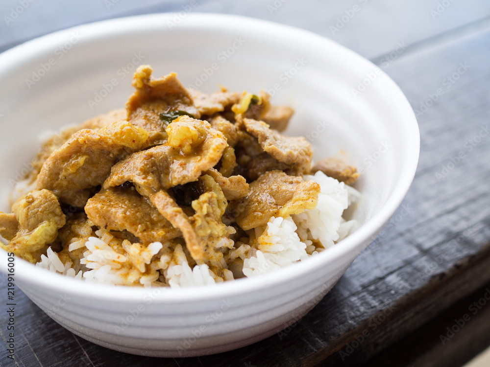 Red curry pork with rice in foam cup