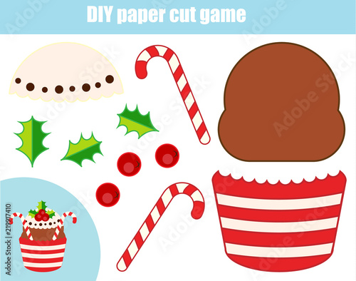 DIY children educational creative game. Paper cutting activity. Make a New Year, Christmas cupcake with glue