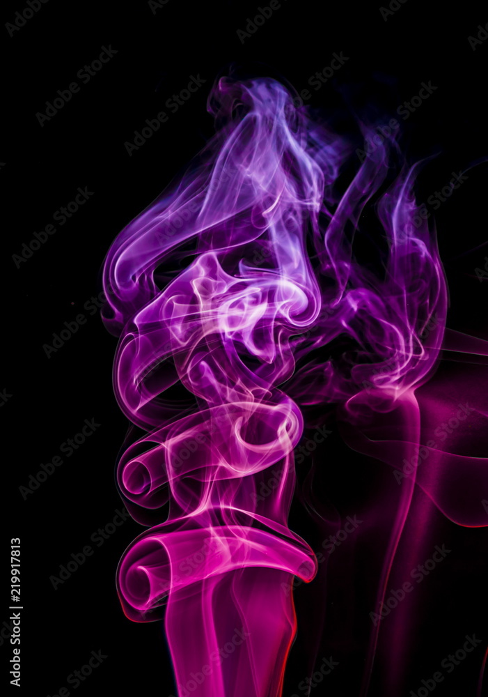 Obraz premium Colored smoke on black background