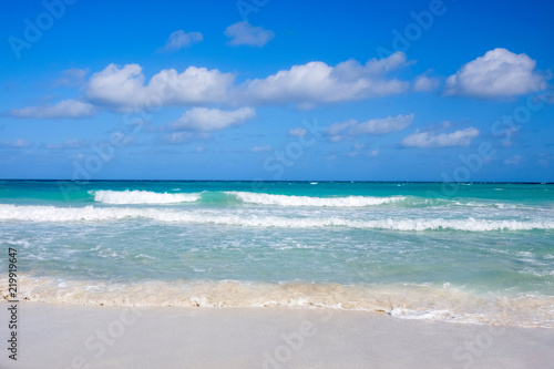 White sandy beach and blue sea, concept of tourism and recreation