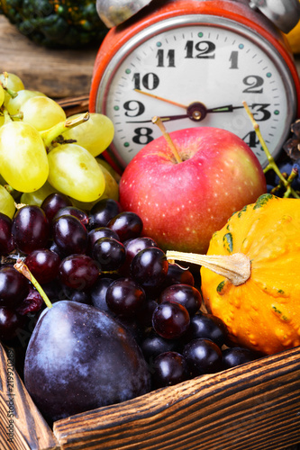 Beautiful autumn harvest and clock