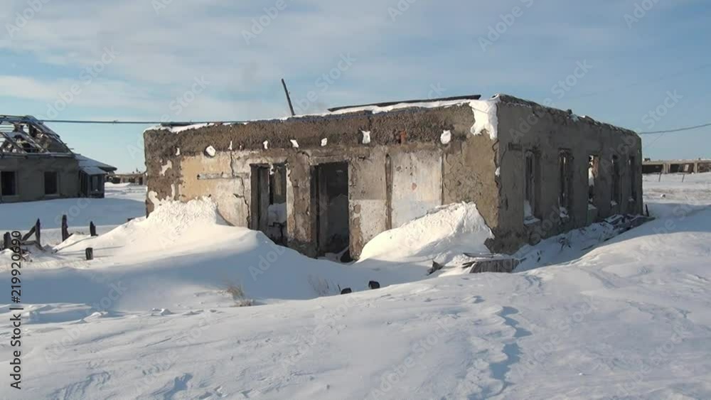 Ruins snow abandoned city Coal Mines on Chukotka of far north of Russia. Way to ghost town Gudym. Unique place for stalkers. Ruins snow abandoned city Coal Mines on Chukotka of far north of Russia. Way to ghost town Gudym. Unique place for stalkers.