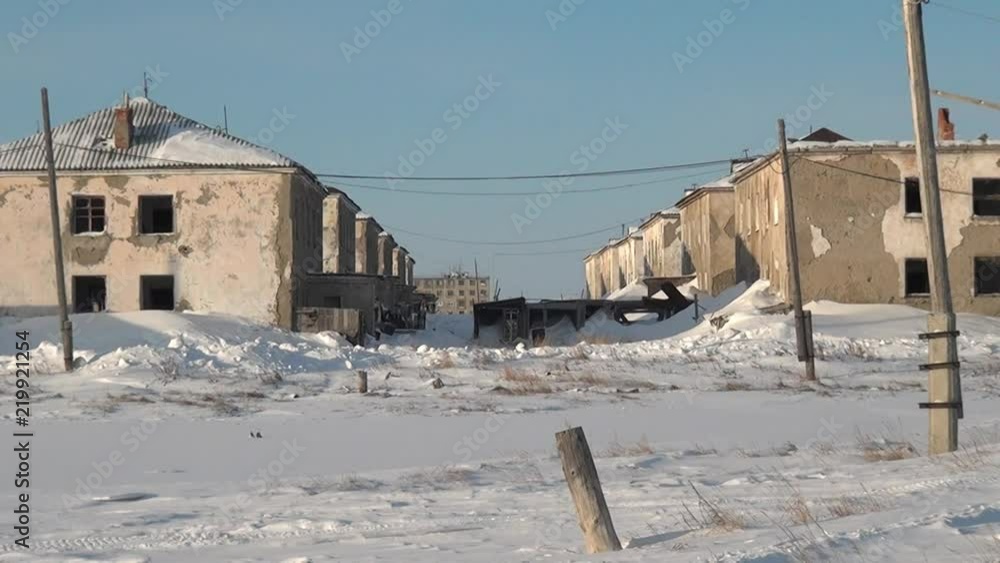 Snow abandoned city Coal Mines on Chukotka of far north of Russia. Way to ghost town Gudym. Unique place for stalkers. Snow abandoned city Coal Mines on Chukotka of far north of Russia. Way to ghost town Gudym. Unique place for stalkers.