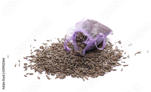 Fototapeta Naklejka Na Ścianę i Meble -  Dry lavender pile with purple pouch isolated on white background