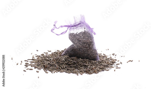 Fototapeta Naklejka Na Ścianę i Meble -  Dry lavender pile with purple pouch isolated on white background