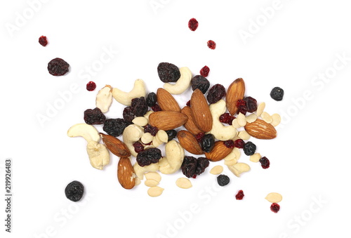 Mix of various nuts, raisins, berries and seeds isolated on white background, top view