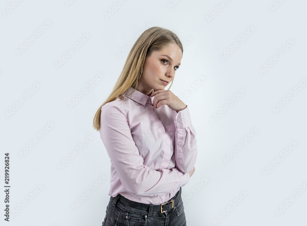 Striking a gentle pose. This young girl has a beautiful make up. Striking a gentle pose. This young girl has a beautiful make up.
