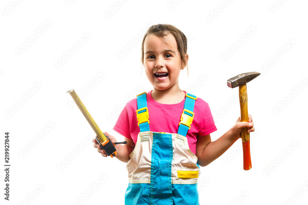 Portrait of a girl builder with a hammer on her shoulder isolated on white background Portrait of a girl builder with a hammer on her shoulder isolated on white background