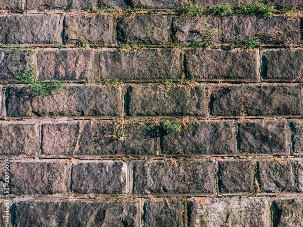 Old gray vintage weathered brick wall texture of ancient castle. Grunge  rough block stonewall, masonry structure surface pattern as wallpaper or  backdrop for design with copy space Stock Photo | Adobe Stock