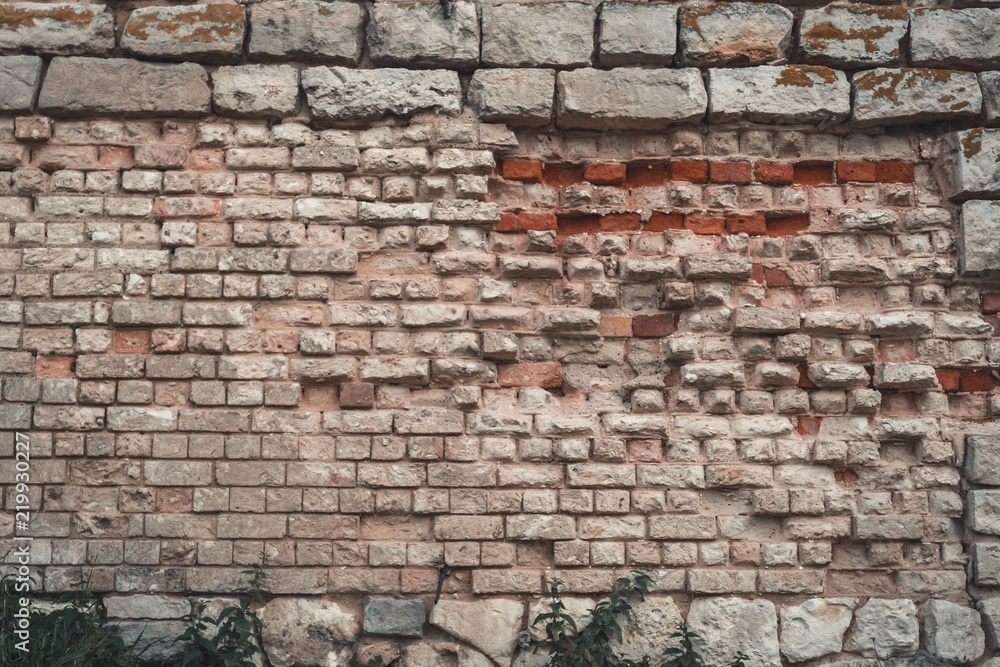 Antique red brick wall surface texture grunge background, vintage weathered masonry stonewall Antique red brick wall surface texture grunge background, vintage weathered masonry stonewall