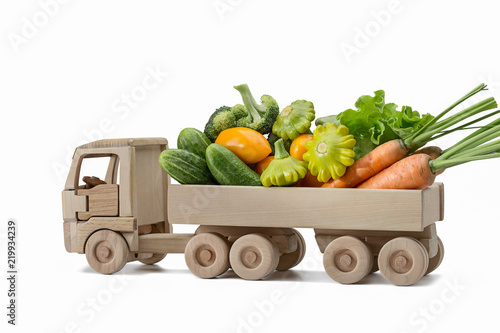 Set of different fresh vegetables on wooden truck.