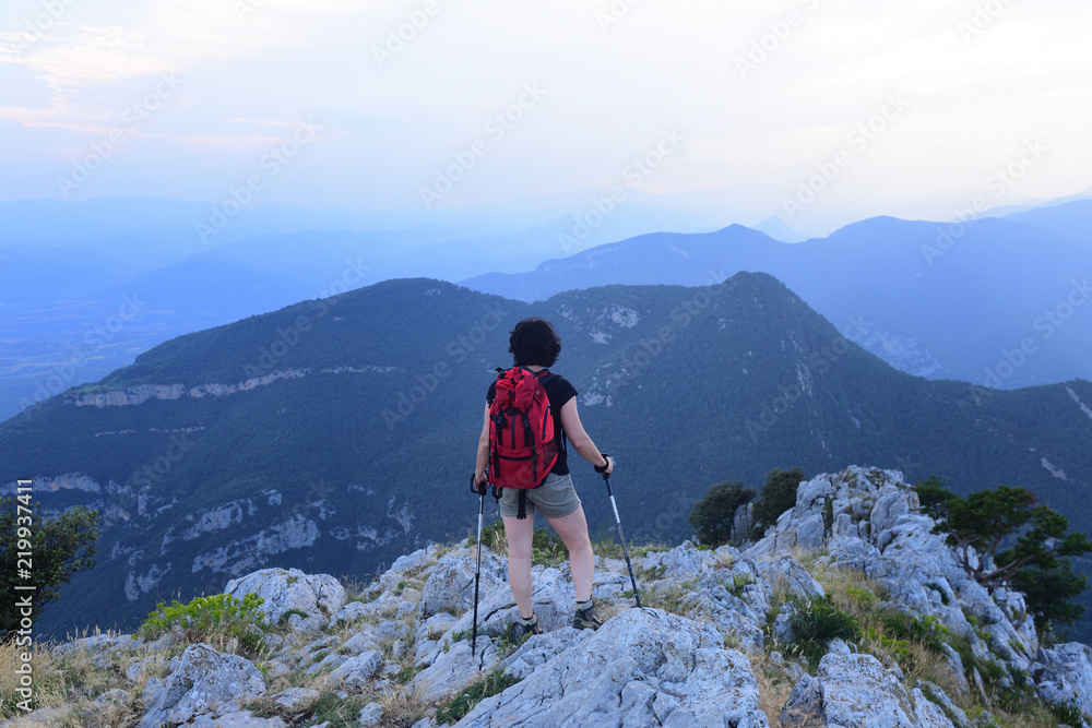 Hiker woman looking at the landscape