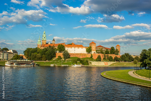 tourism and guide concept of medieval old castle in river waterfront old city district 