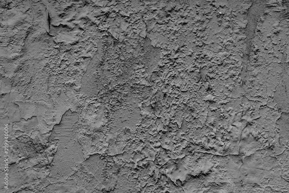 Fototapeta premium Wall fragment with scratches and cracks. It can be used as a background