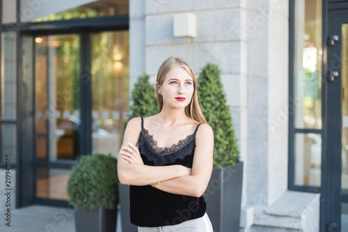 beautiful young business woman on the street waiting for a meeting with the client Free Download beautiful young business woman on the street waiting for a meeting with the client - GFXLoad