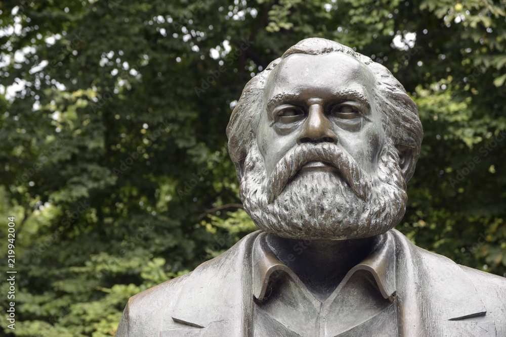 Karl Marx sculpture, detail of the monument in the Marx-Engels-Forum, a public park in the central Mitte district of Berlin, Germany