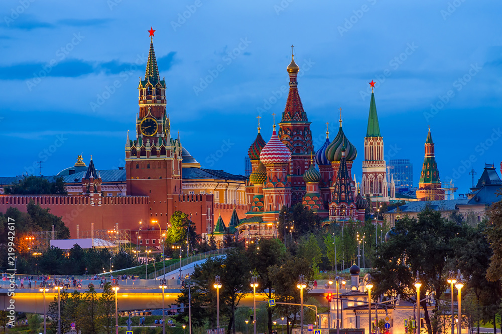 Spasskaya Tower, Moscow Kremlin and Saint Basil s Cathedral in Moscow, Russia. Architecture and landmarks of Moscow. Postcard of Moscow
