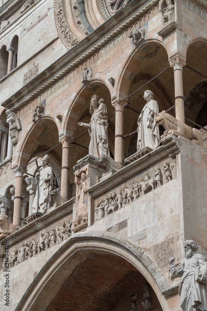Details of the ornate marble facade at Cremona Cathedral
