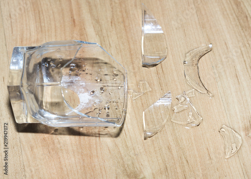 broken glass with water on the floor