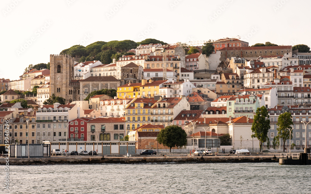 Alfama, Lisboa, Portugal. Traditional Lisbon hillside architecture rising from the banks of the Tagus River up through the steep hill streets.