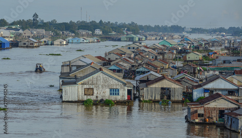 Mekong River with floating village photo