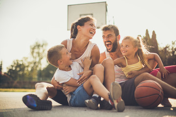 Family after basketball have fun together.