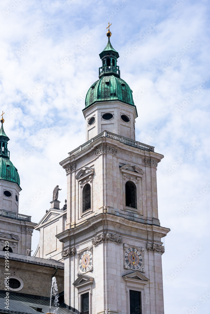 Fototapeta premium Top of a church in Salzburg, Austria, on a cloudy day but some blue sky in the background 