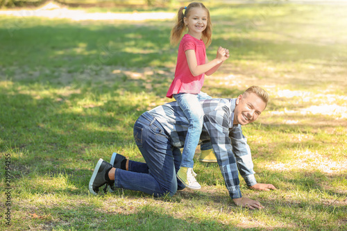 Happy father and daughter p...