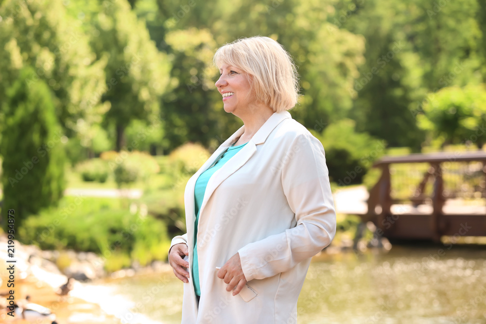 Portrait of beautiful mature woman outdoors Portrait of beautiful mature woman outdoors