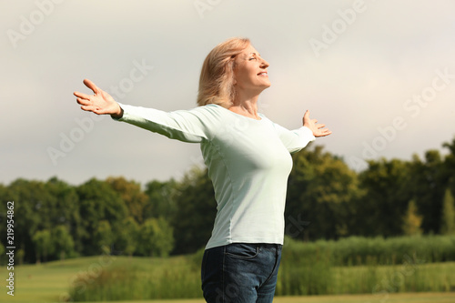 Beautiful mature woman outd...