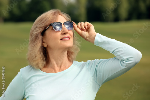 Beautiful mature woman outd...