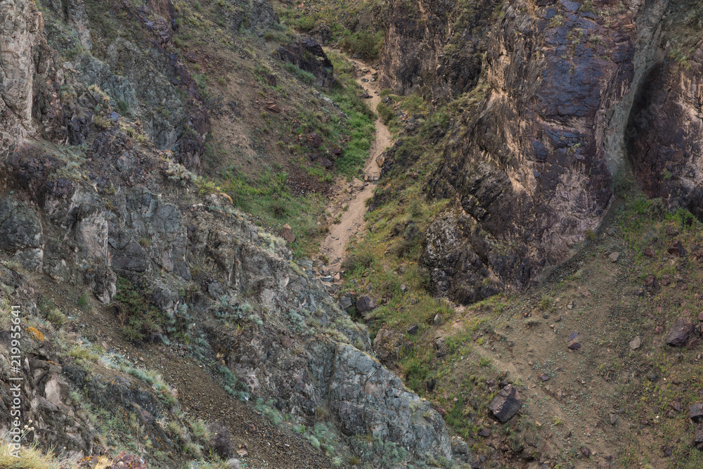 a deep stone canyon, the famous Charyn Canyon, Kazakhstan