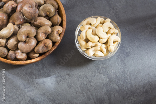 Walnuts and cashew oil on the table - Anacardium occidentale. marañón photo