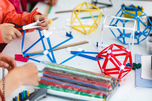 Foto Colored boxes with paper strips, inventions and creativity for children