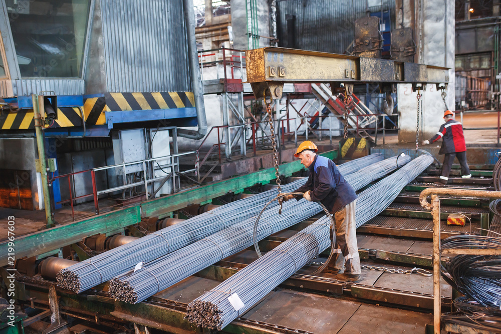 Naklejka premium building armature are located in the warehouse of metallurgical products. Element of the constructional structure.