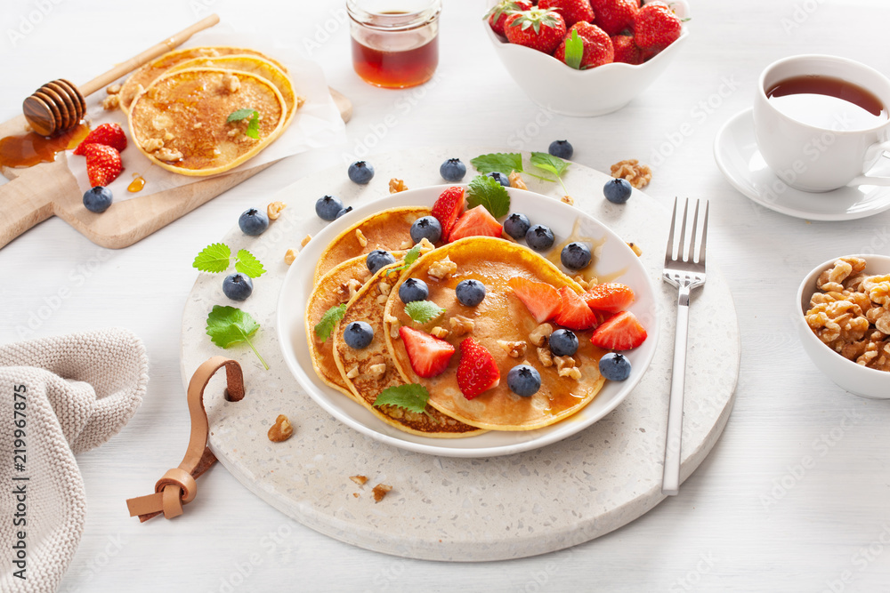 pancakes with blueberry strawberry honey and nuts for breakfast pancakes with blueberry strawberry honey and nuts for breakfast