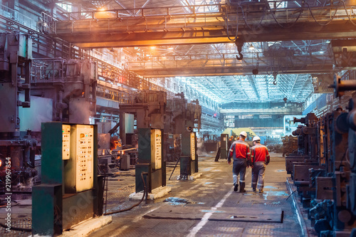 Workers in the steel mill. photo