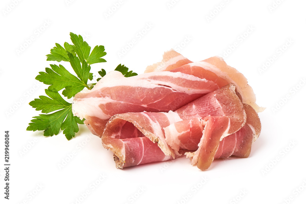 Twisted pieces of pork farmer meat or bacon with parsley, isolated on white background. Twisted pieces of pork farmer meat or bacon with parsley, isolated on white background.
