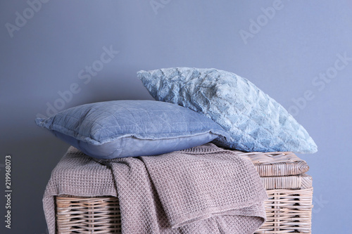 Two soft blue pillows and a...