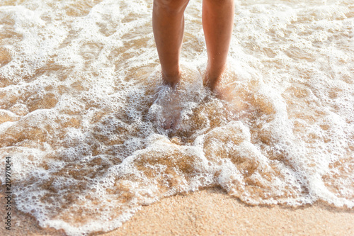Feet on sand.