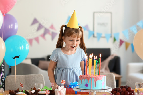 Cute little girl with birth...