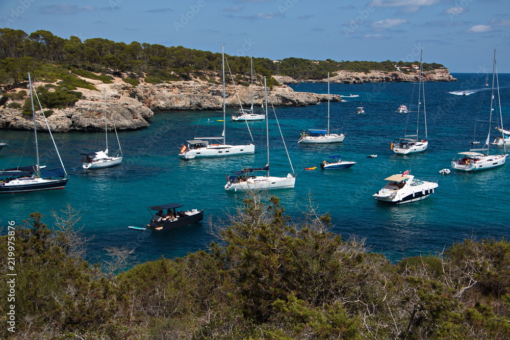 Boats in the bay of Cala Mondrago on Mallorca
