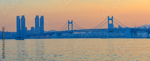 Colorful sunset over Gwangandaegyo (Diamond Bridge), a suspension bridge, Busan city, Korea © yooranpark